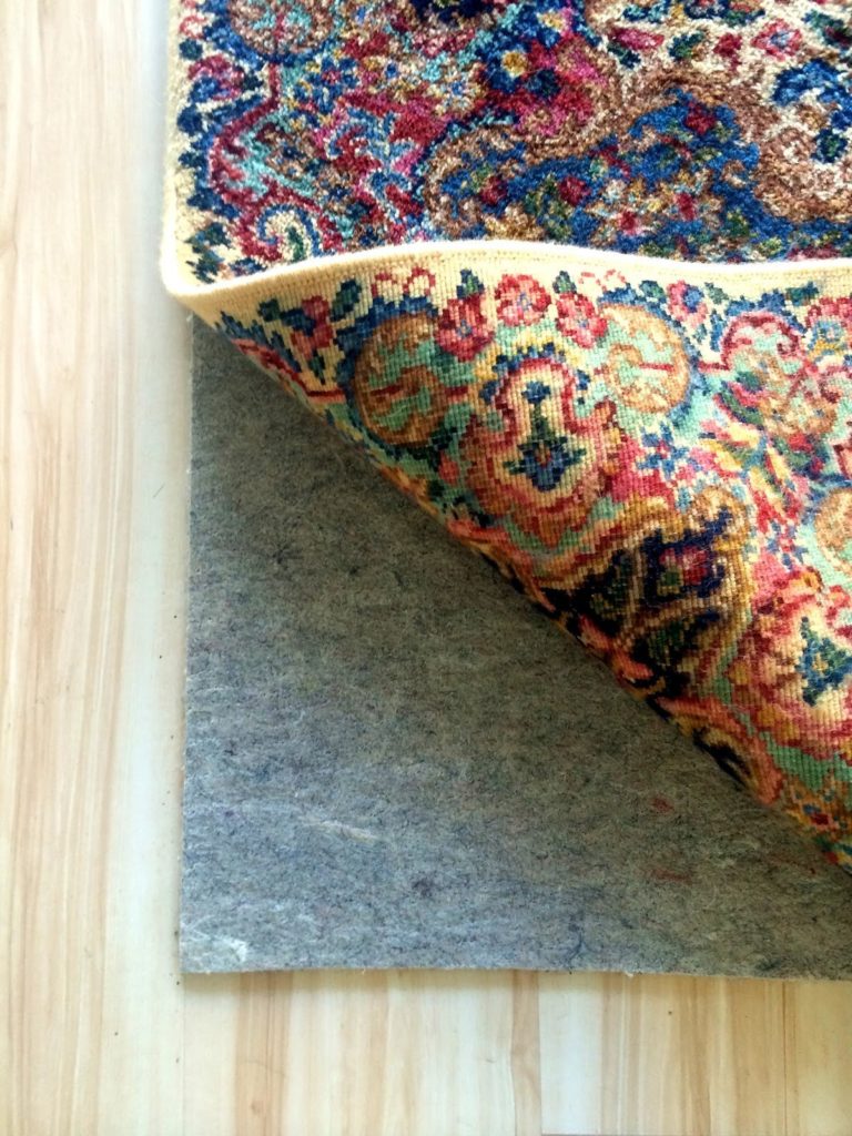 Three Benefits of A Rug Pad for Your Home's Area Rugs